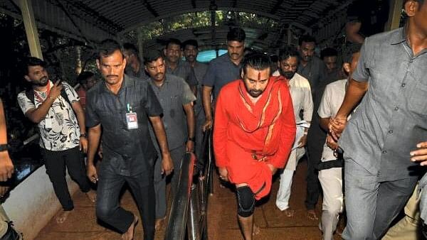 <div class="paragraphs"><p>Andhra Pradesh Deputy Chief Minister Pawan Kalyan, who undertook a purification ritual amid the Tirupati laddu controversy, walks to Tirumala temple via the Alipiri stairway, in Tirupati district.</p></div>