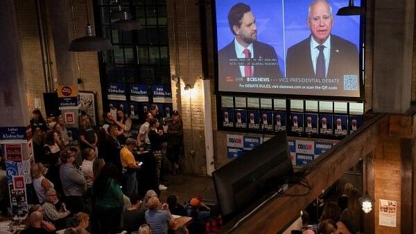 <div class="paragraphs"><p>People watch the Vice Presidential debate, in St. Paul.</p></div>