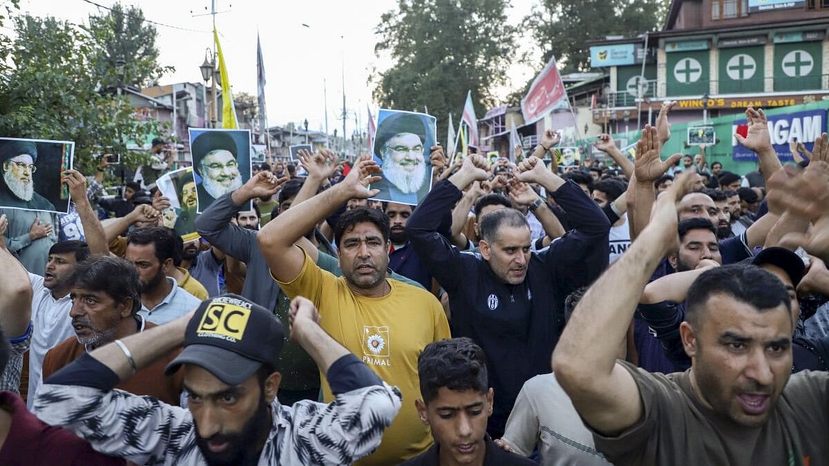 <div class="paragraphs"><p>Kashmiri Shia Muslim protesters shout anti-Israeli and anti-U.S slogans during their protest march against the killing of Hezbollah leader Hassan Nasrallah in Israeli airstrikes in Beirut.</p></div>