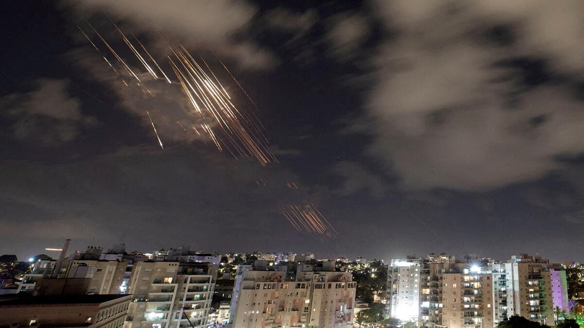 <div class="paragraphs"><p>Israel's Iron Dome anti-missile system intercepts rockets after Iran fired a salvo of ballistic missiles, as seen from Ashkelon.</p></div>