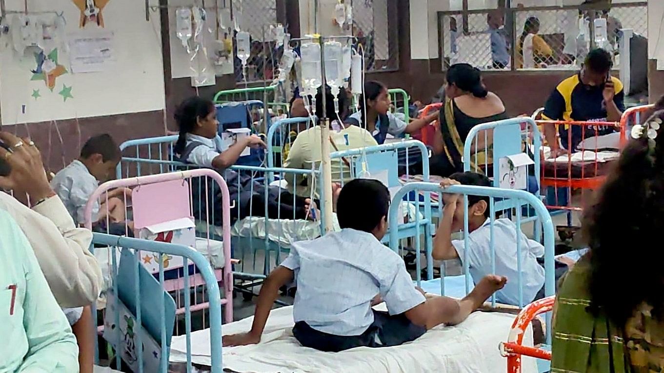 <div class="paragraphs"><p>Students, who fell sick due to suspected food poisoning after consuming mid-day meal at a private school, receive treatment at a hospital, in Thane district, Maharashtra. </p></div>