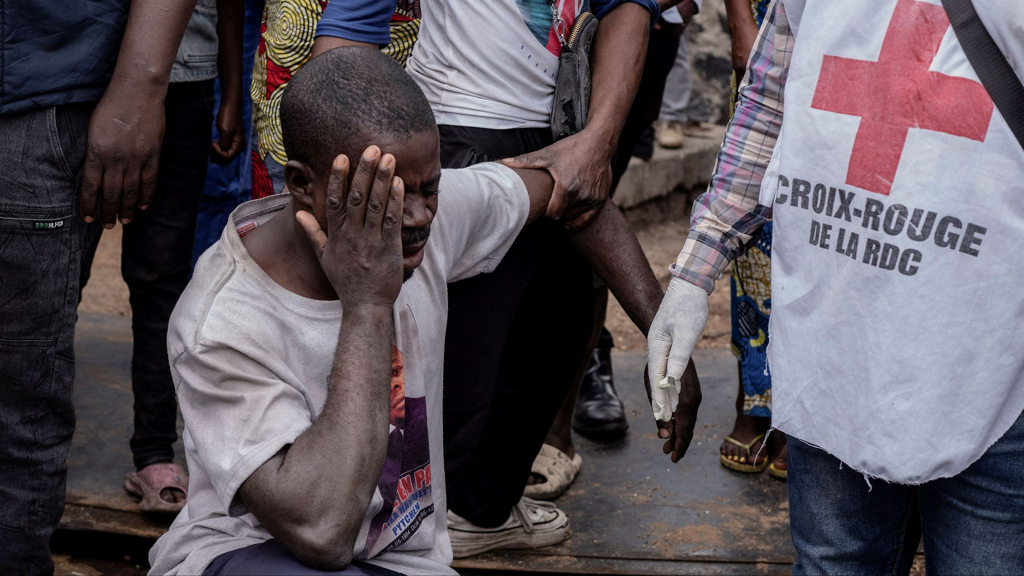 <div class="paragraphs"><p>A man reacts after his family member died after a boat ferrying passengers and goods from the Minova villages sank in Lake Kivu near the Port of Kituku in Goma, North Kivu province of the Democratic Republic of Congo, October 3, 2024.</p></div>