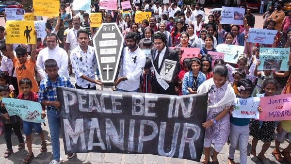 <div class="paragraphs"><p>People take out a silent march praying for peace and harmony in Manipur, in Kochi.</p></div>