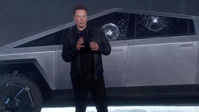 <div class="paragraphs"><p>Tesla CEO Elon Musk in front of a Cybertruck.</p></div>