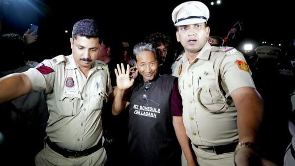 <div class="paragraphs"><p>Climate activist Sonam Wangchuk being taken by police personnel after he along with other Ladakhis, was brought to Rajghat on Gandhi Jayanti, in New Delhi, Wednesday, Oct 2, 2024.</p></div>