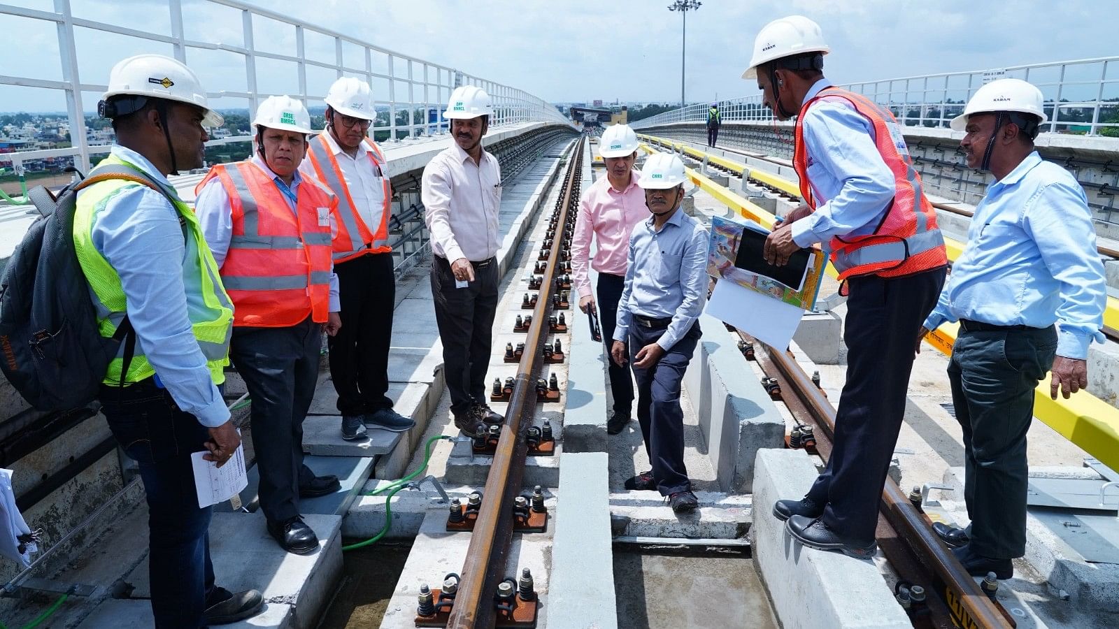 <div class="paragraphs"><p>Commissioner of Metro Railway Safety (Southern Circle) A M Chowdhary (third from right) inspects Namma Metro's newly constructed line (Nagasandra-Madavara) on Thursday (October 3).&nbsp;</p></div>