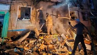 <div class="paragraphs"><p>Emergency workers try to extinguish a fire after a Russian guided bomb struck a five-story apartment block at a location given as Kharkiv, Ukraine, in this handout image released October 3, 2024. </p></div>