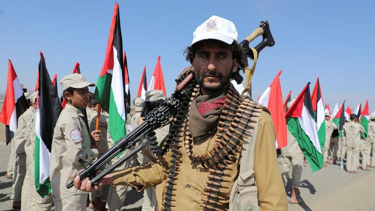 <div class="paragraphs"><p>A Houthi tribesman poses for a photo.</p></div>