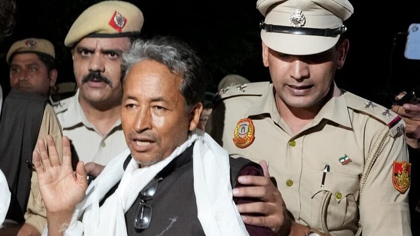 <div class="paragraphs"><p>Climate activist Sonam Wangchuk being taken by police personnel after he along with other Ladakhis, was brought to Rajghat on Gandhi Jayanti, in New Delhi.</p></div>