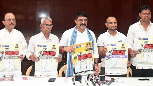 <div class="paragraphs"><p>Kudroli Sri Gokarnanatha Temple management committee trustee Padmaraj R and others release the poster of the half marathon to be held on October 6 as part of the Mangaluru Dasara, in Mangaluru on Friday.</p></div>