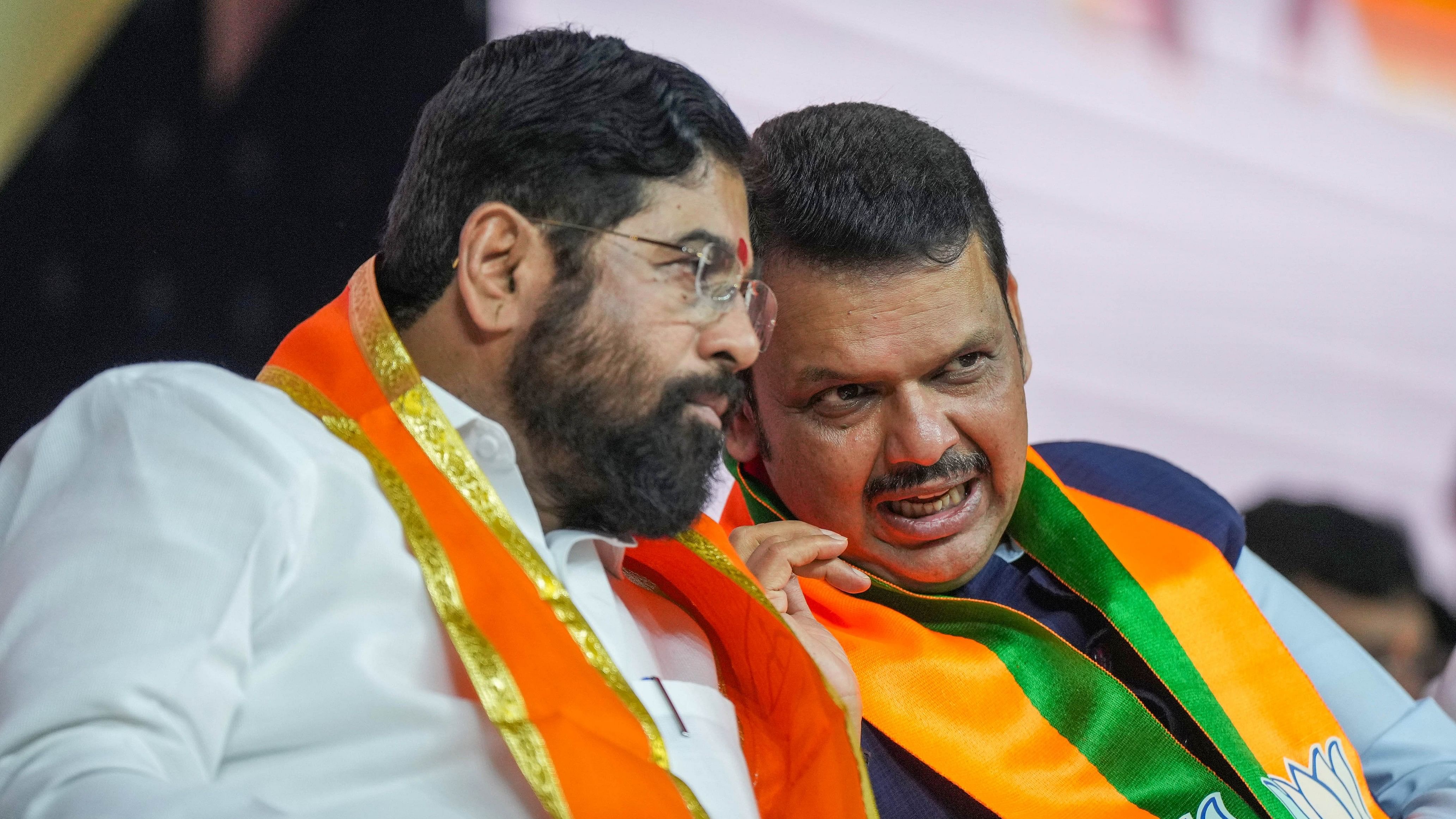 <div class="paragraphs"><p> Maharashtra Chief Minister Eknath Shinde with Deputy Chief Minister Devendra Fadnavis during the 'Mahayuti' alliance meeting.</p></div>