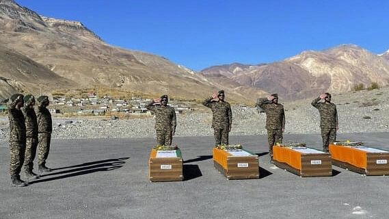 <div class="paragraphs"><p>Military personnel pay tribute to the mortal remains of personnel from the Indian Air Force (IAF) AN-12 aircraft which crashed on Rohtang Pass in 1968 and were recovered during a recent expedition, before they are taken to their hometown.</p></div>