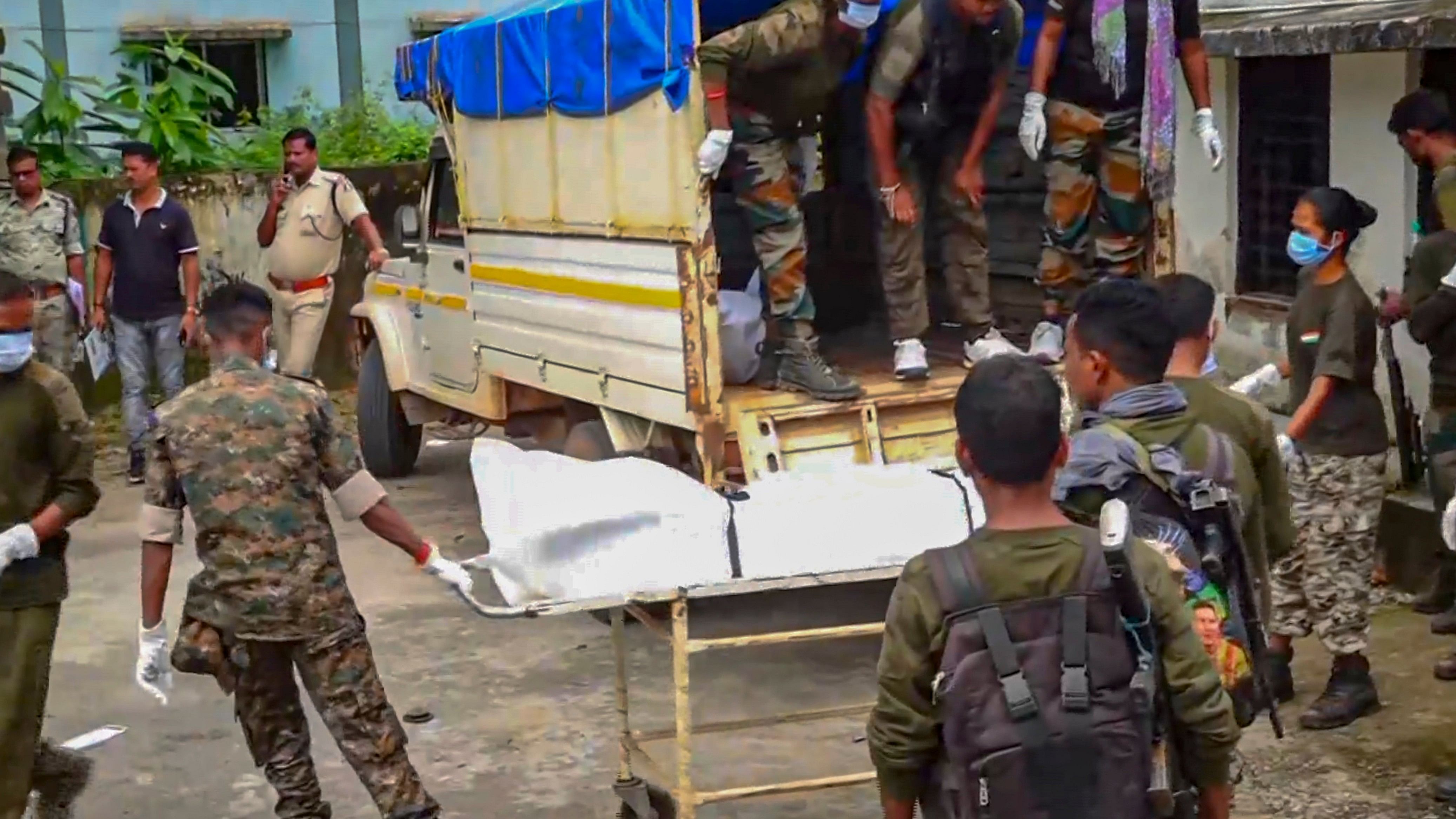 <div class="paragraphs"><p>Security personnel shift the mortal remains of one of the Naxals, killed in an encounter with security forces, to a government hospital. </p></div>