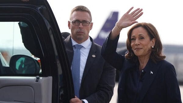 <div class="paragraphs"><p>Democratic presidential nominee and US Vice President Kamala Harris waves upon arrival at Bishop International Airport in Flint, Michigan, US, October 4, 2024. </p></div>