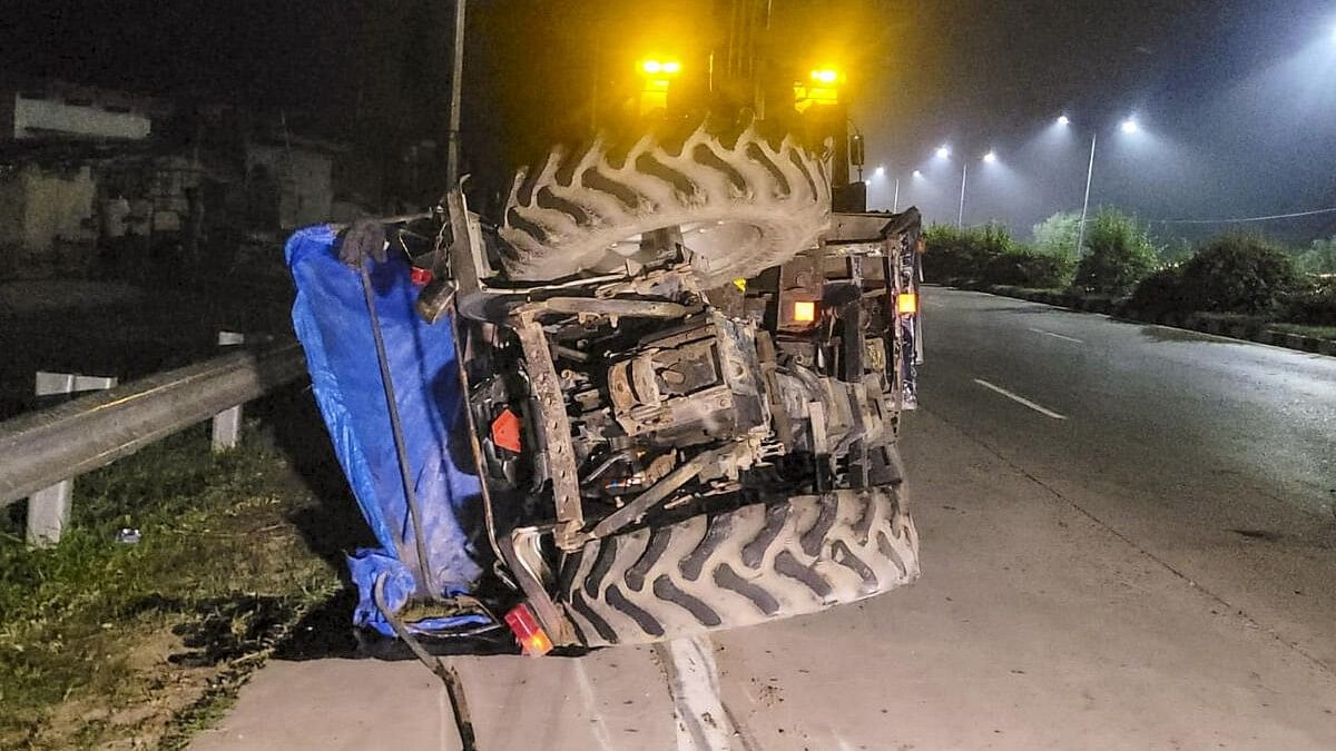 <div class="paragraphs"><p>An overturned tractor trolley is seen after its collision with a truck, in Mirzapur district.</p></div>