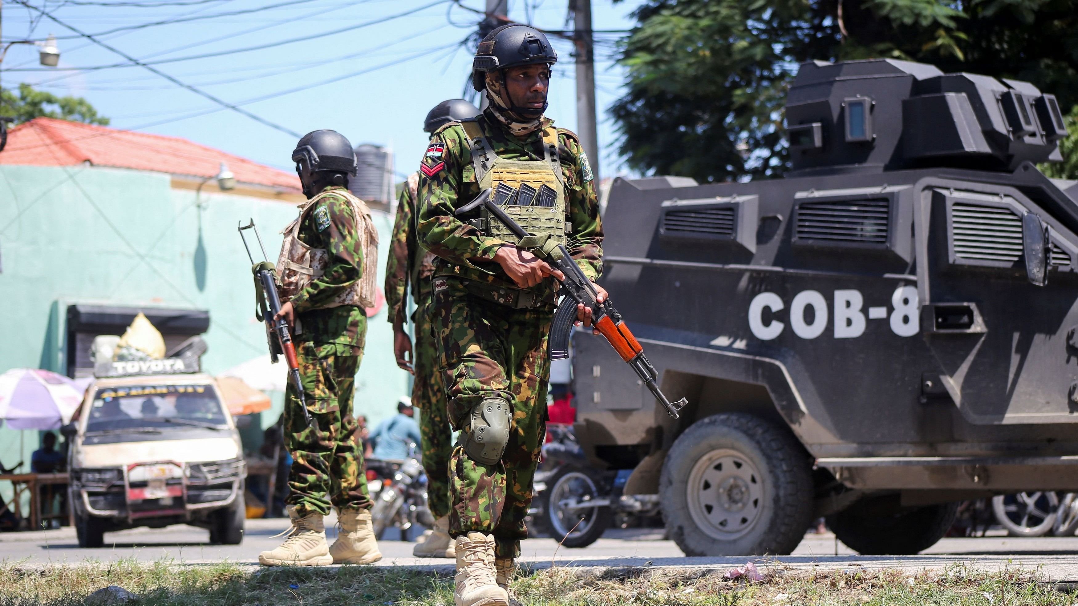 <div class="paragraphs"><p>Kenyan police officers patrol as the country is facing emergency food insecurity while immersed in a social and political crisis, in Port-au-Prince, Haiti, October 3, 2024.</p></div>