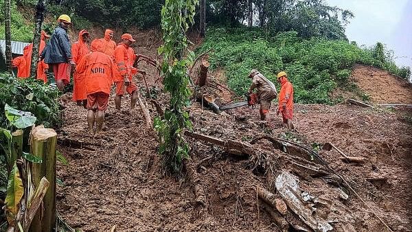 <div class="paragraphs"><p>Search operation underway to retrieve the bodies of members of a family who got buried in a landslide, at Hatiasia Songma under Gasuapara in South Garo Hills district, Meghalaya. </p></div>