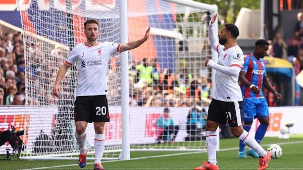 <div class="paragraphs"><p>Premier League - Crystal Palace v Liverpool - Selhurst Park, London, Britain - October 5, 2024 - Liverpool's Diogo Jota celebrates scoring their first goal with&nbsp; Mohamed Salah.</p></div>