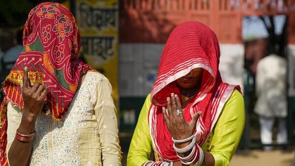 <div class="paragraphs"><p>Women voter at a polling station at Balali village during the Haryana Assembly elections, in Charkhi Dadri district, Saturday.&nbsp;</p></div>