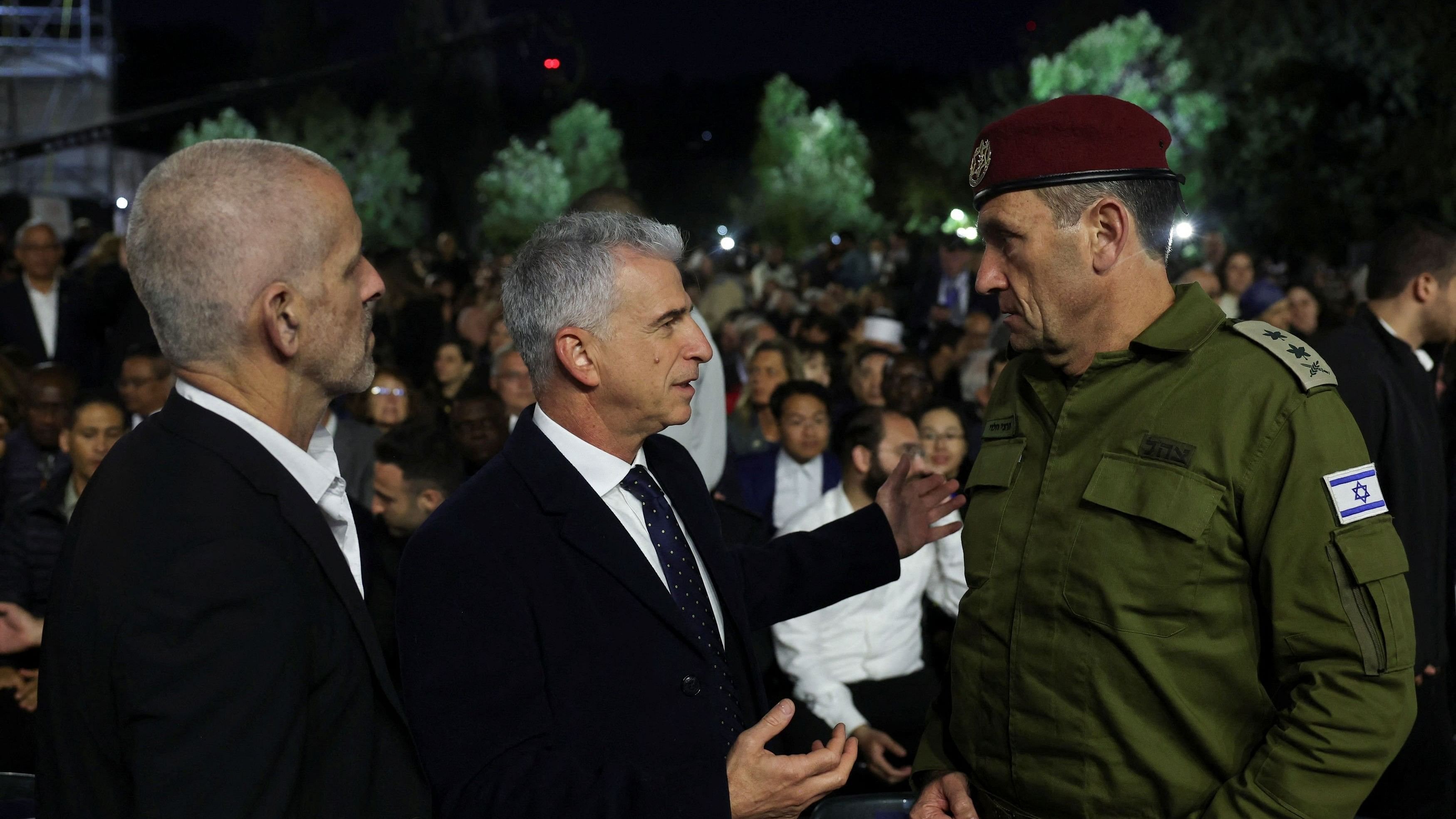 <div class="paragraphs"><p>Israeli military Chief of General Staff Herzi Halevi speaks with David Barnea, the head of the Israeli Mossad during the opening ceremony marking Israel's national Holocaust Remembrance Day at Yad Vashem, the World Holocaust Remembrance Center, in Jerusalem May 5, 2024. </p></div>