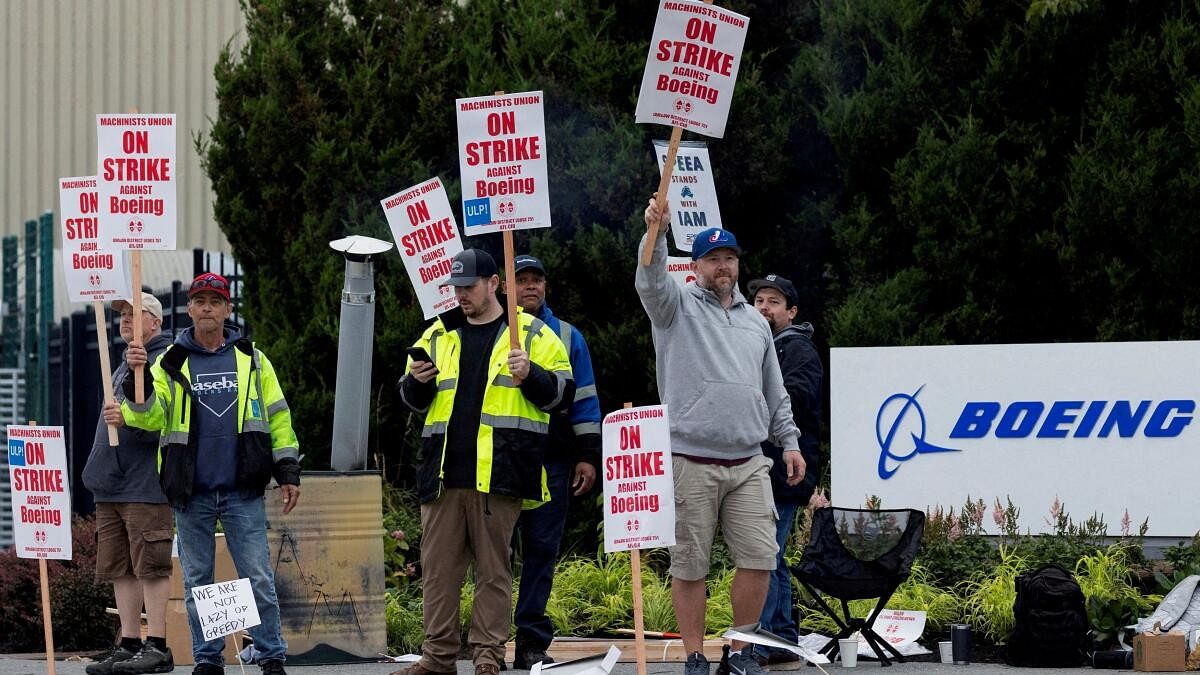 <div class="paragraphs"><p>Boeing factory workers gather on a picket line during the first day of a strike near the entrance of a production facility in Renton, Washington.&nbsp;</p></div>