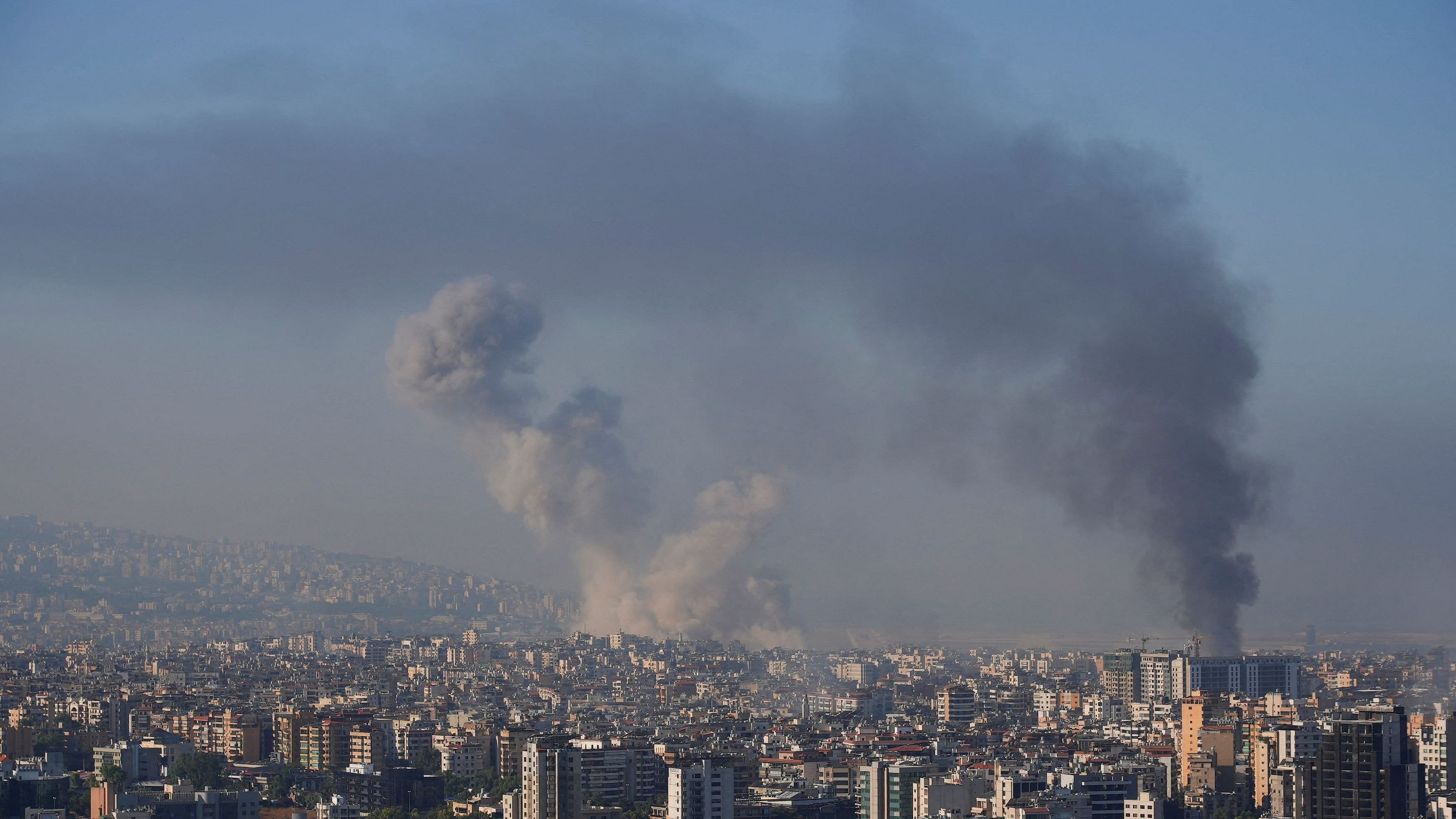 <div class="paragraphs"><p>Smoke billows over Beirut's southern suburbs, amid ongoing hostilities between Hezbollah and Israeli forces, as seen from Sin El Fil, Lebanon.</p></div>