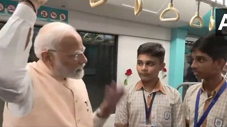 <div class="paragraphs"><p>PM Modi takes ride in Mumbai's newest metro.</p></div>