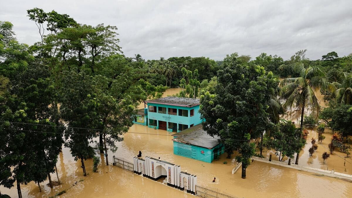 <div class="paragraphs"><p> A view shows a partially submerged school and madrasa premises amid severe flooding in the Fazilpur area of Feni, Bangladesh.</p></div>