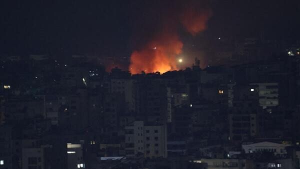 <div class="paragraphs"><p>Smoke and flames rise over Beirut's southern suburbs after a strike, amid ongoing hostilities between Hezbollah and Israeli forces, as seen from Sin El Fil, Lebanon, October 6, 2024. </p></div>