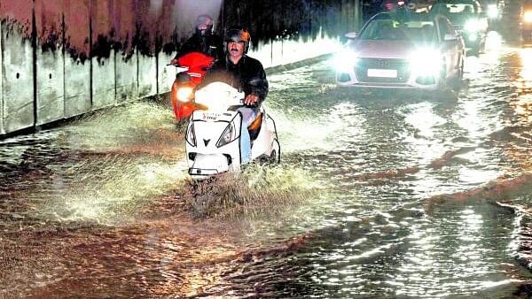 <div class="paragraphs"><p>Rain water logging in Madiwala under pass due to rain in Bengaluru on Saturday.&nbsp;</p></div>