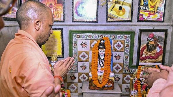 <div class="paragraphs"><p>Uttar Pradesh Chief Minister Yogi Adityanath worships 'Durga Maa', in the Varanasi district, Monday, Oct. 7, 2024.</p></div>