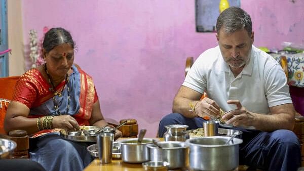 <div class="paragraphs"><p>Leader of Opposition in Lok Sabha Rahul Gandhi has a meal during a visit to the residence of Ajay Tukaram Sanade and Anjana Tukaram Sanade, who belong to the Dalit community, in Kolhapur, Maharashtra.</p></div>