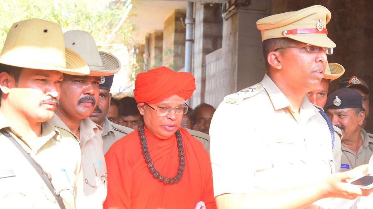 <div class="paragraphs"><p>A file image of&nbsp;Shivamurthy Sharana being taken to police custody.&nbsp;</p></div>