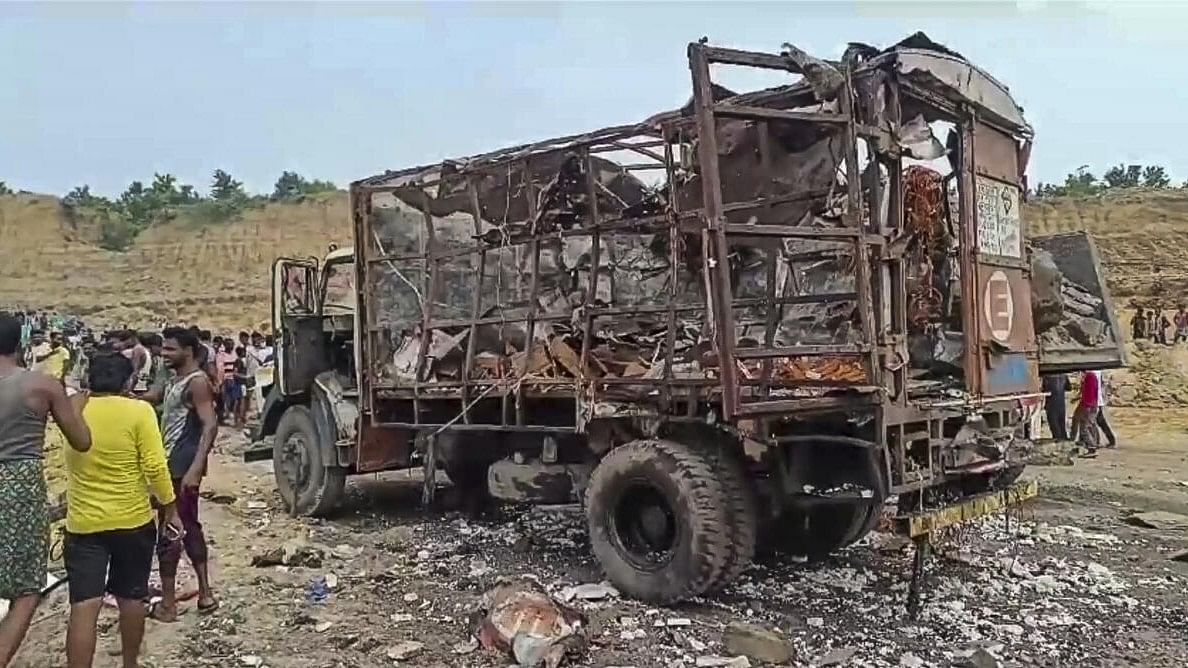 <div class="paragraphs"><p>Charred remains of a vehicle parked at a coal mine where a blast occured at Bhadulia in Birbhum district of West Bengal.</p></div>