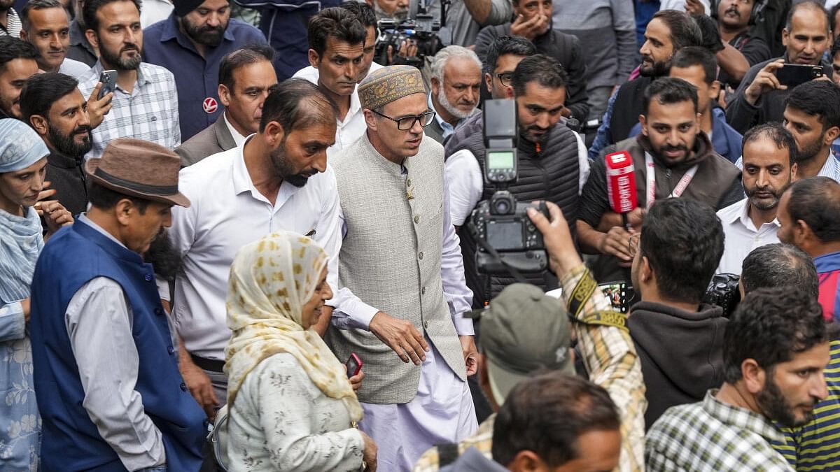 <div class="paragraphs"><p>Jammu and Kashmir National Conference Vice President Omar Abdullah being greeted by supporters after winning the Jammu and Kashmir Assembly elections from Budgam and Ganderbal constituencies, in Srinagar.</p></div>