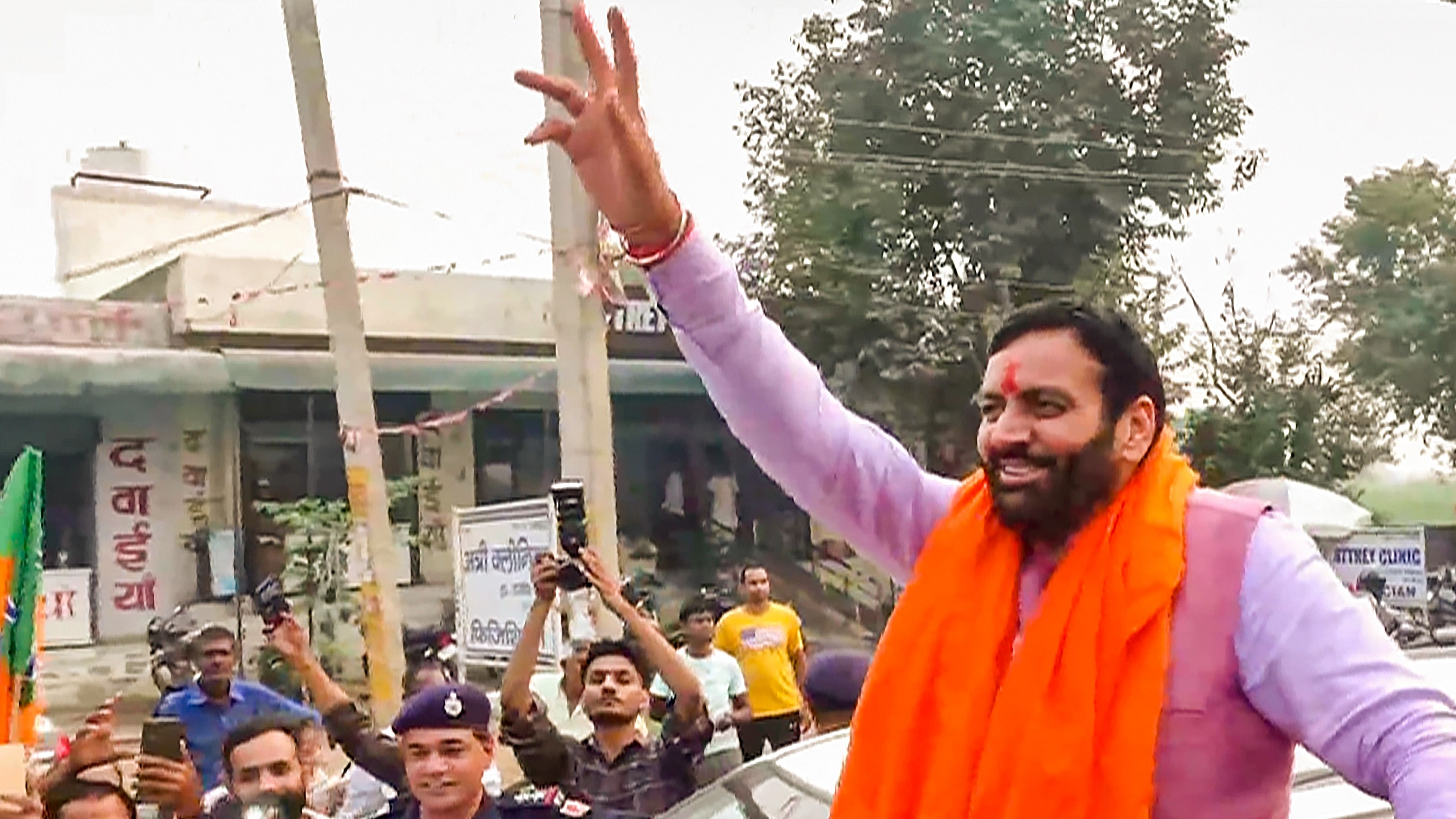 <div class="paragraphs"><p>BJP candidate and Haryana Chief Minister Nayab Singh Saini celebrates with supporters after his victory from Ladwa constituency in the Haryana Assembly elections, on Tuesday.</p></div>