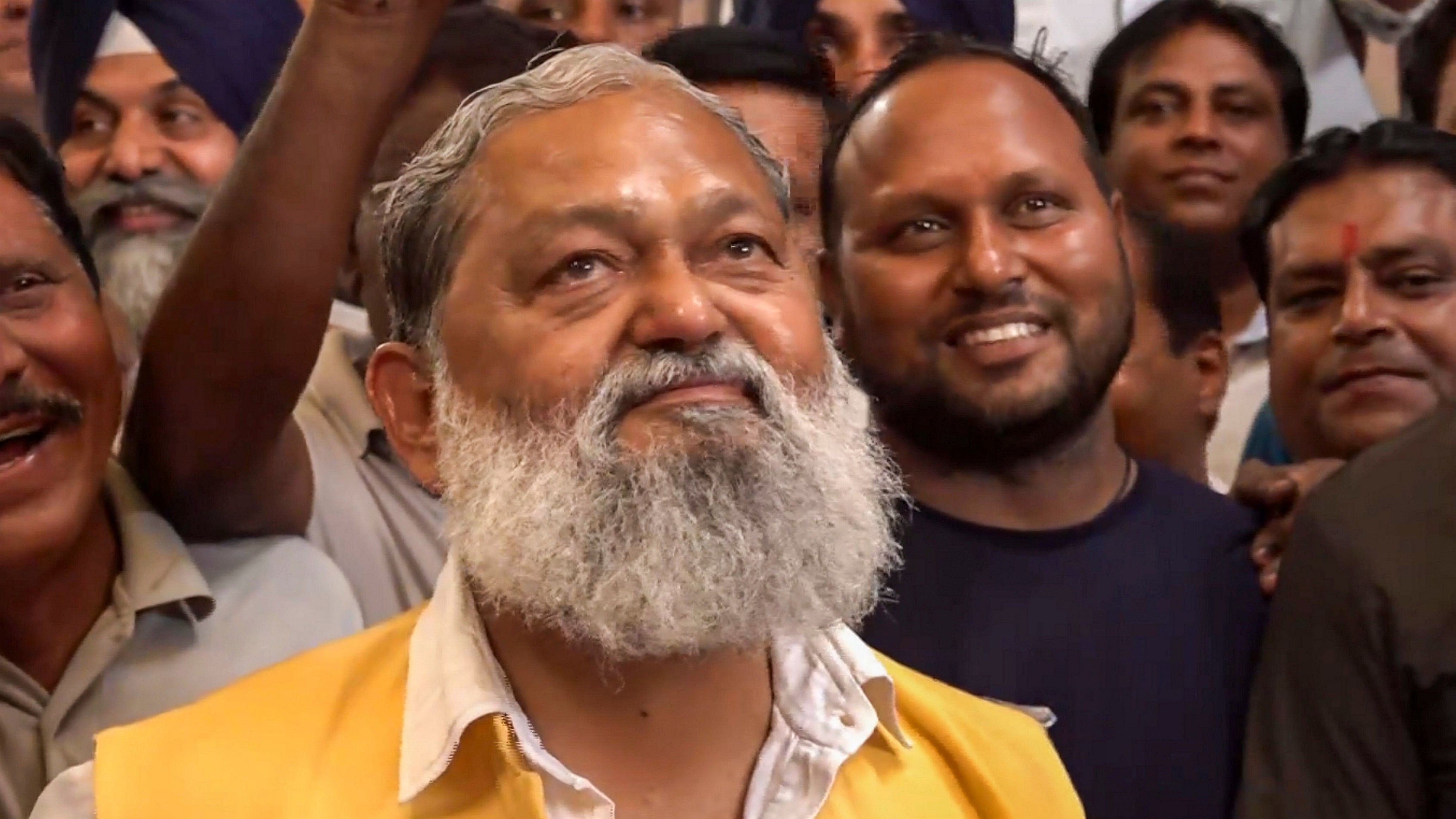 <div class="paragraphs"><p> BJP leader Anil Vij monitors Haryana Assembly poll results with party workers, in Ambala, Tuesday, Oct. 8, 2024. </p></div>