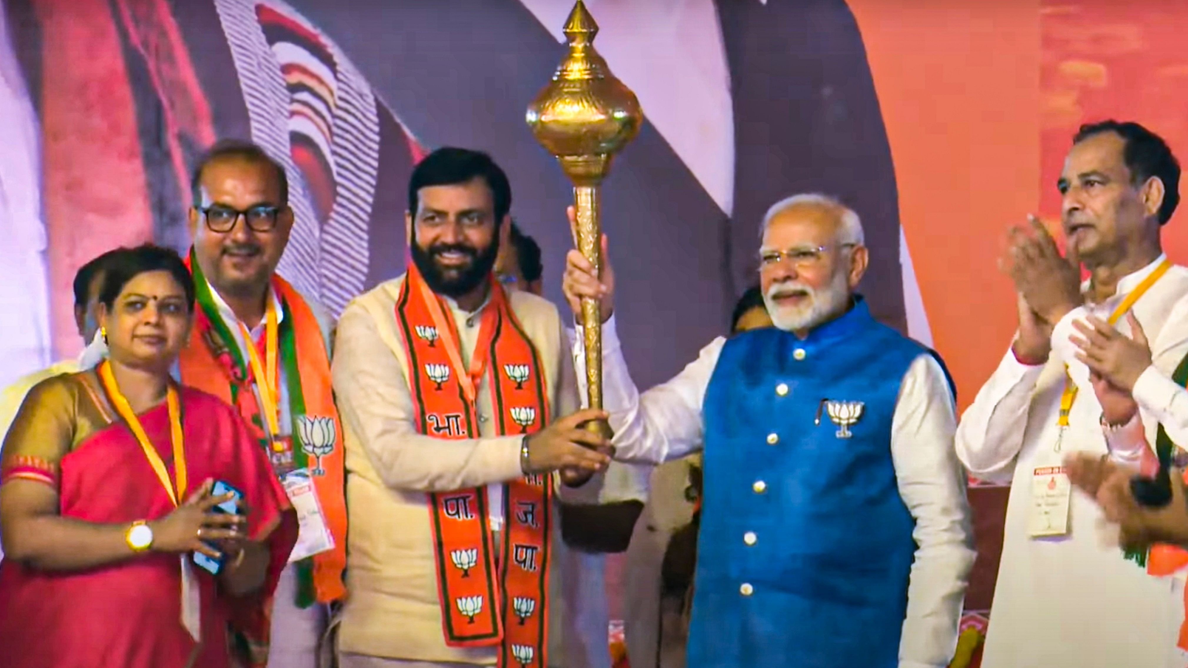 <div class="paragraphs"><p>File Photo: Sonipat: Prime Minister Narendra Modi being presented a mace by Haryana CM Nayab Saini during a public meeting in Sonipat, Haryana.</p></div>