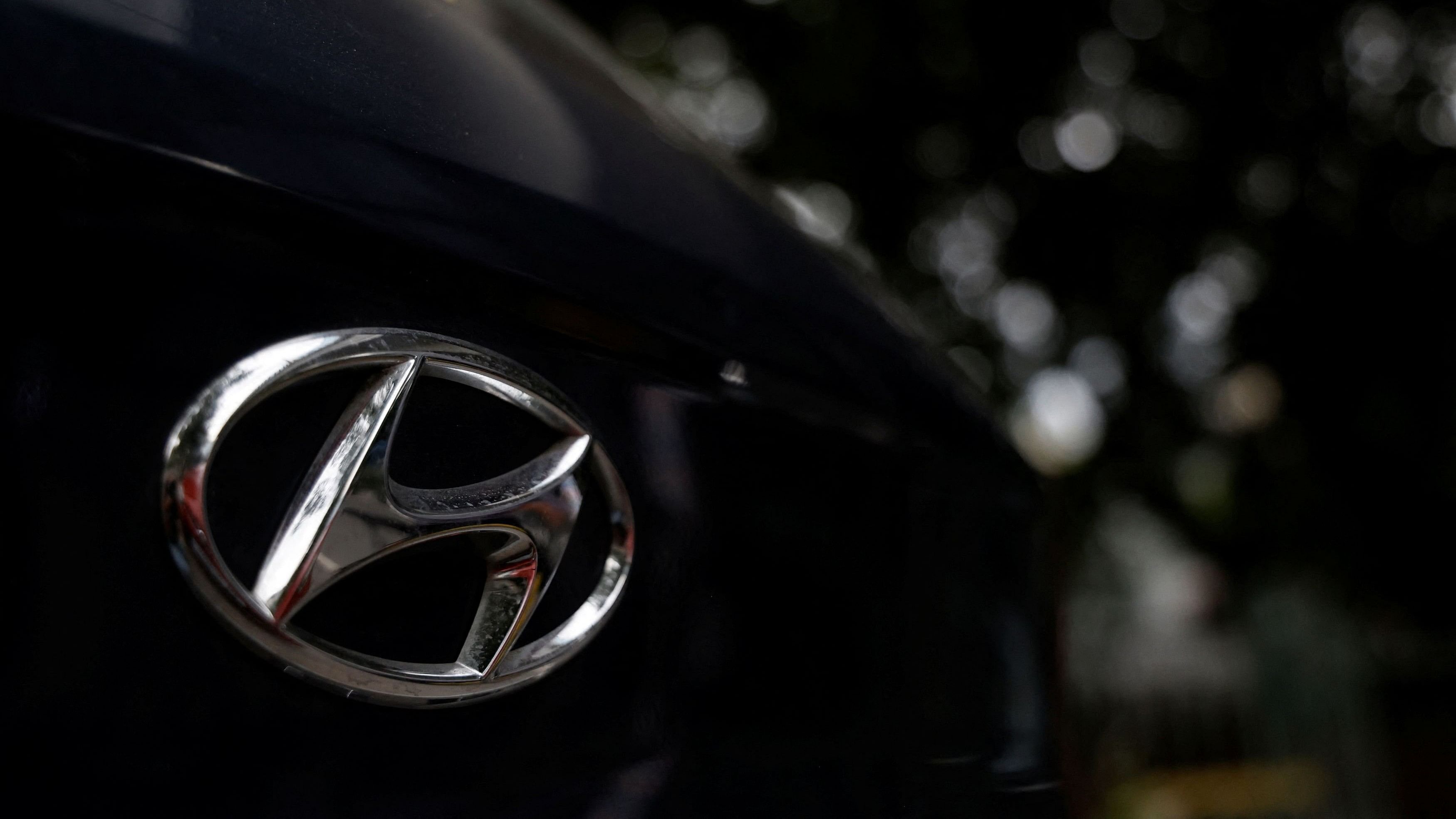 Logo of Hyundai Motor Group on a car outside an automobile showroom is pictured in New Delhi, India, September 6, 2024. REUTERS/Ainnie Arif