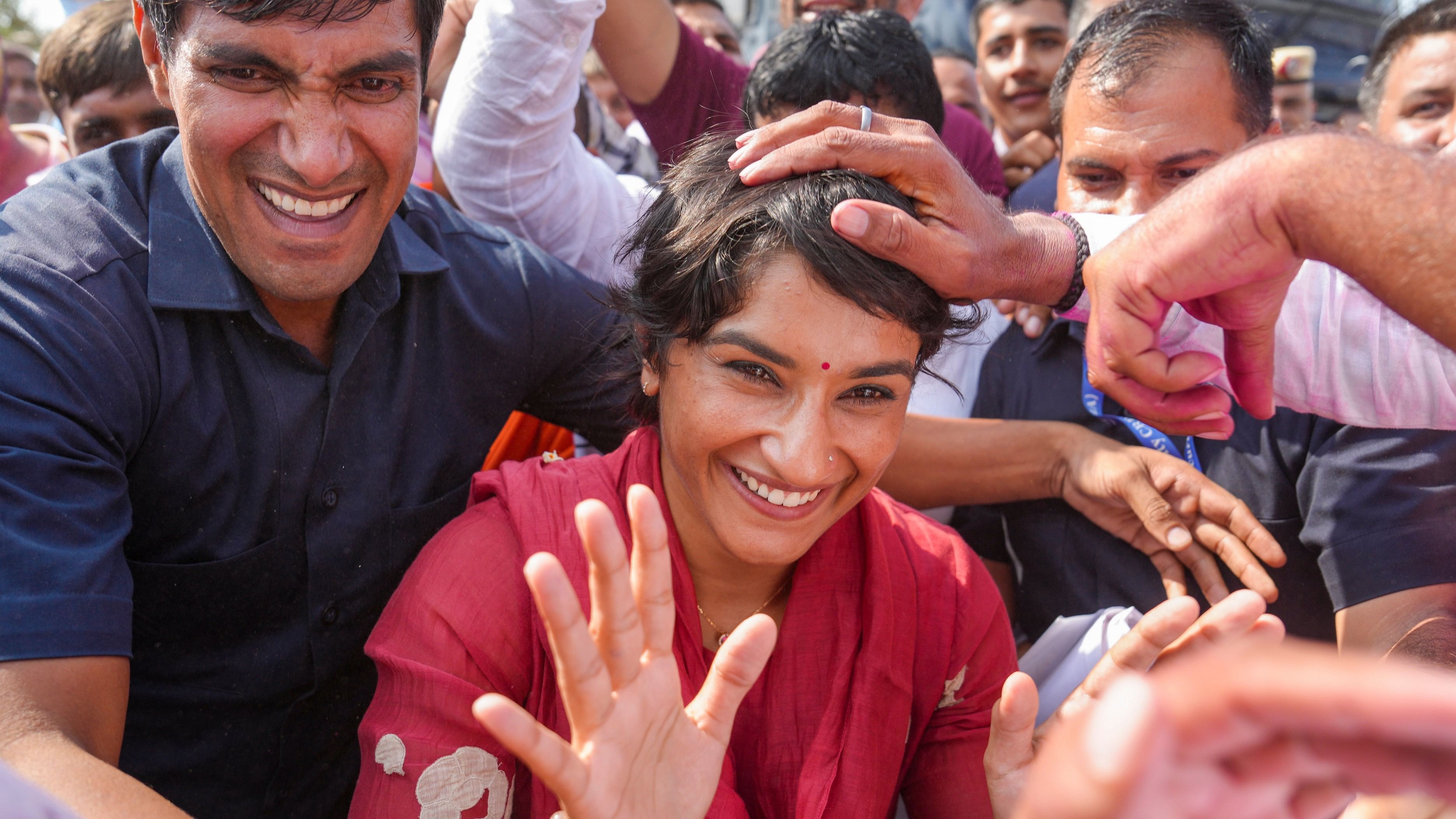 <div class="paragraphs"><p>Jind: Congress candidate Vinesh Phogat celebrates with supporters after her victory from the Julana constituency in the Haryana Assembly elections, in Jind district, Haryana, Tuesday, Oct. 8, 2024. </p></div>