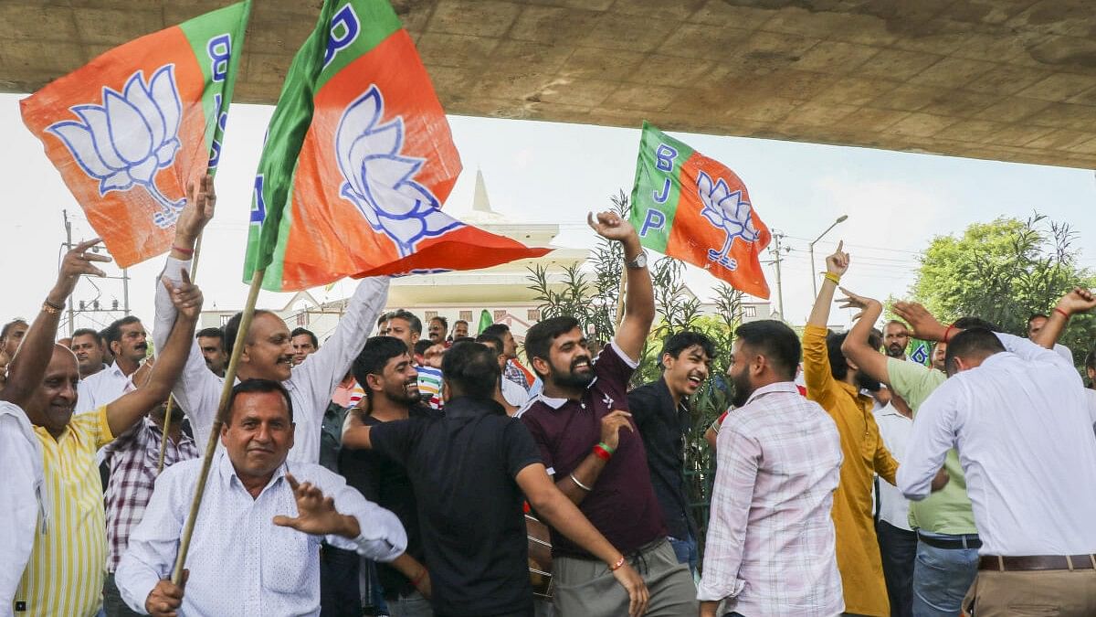 <div class="paragraphs"><p>BJP supporters celebrate party candidate Surinder Bhagat's win in Jammu on Tuesday.&nbsp;</p></div>