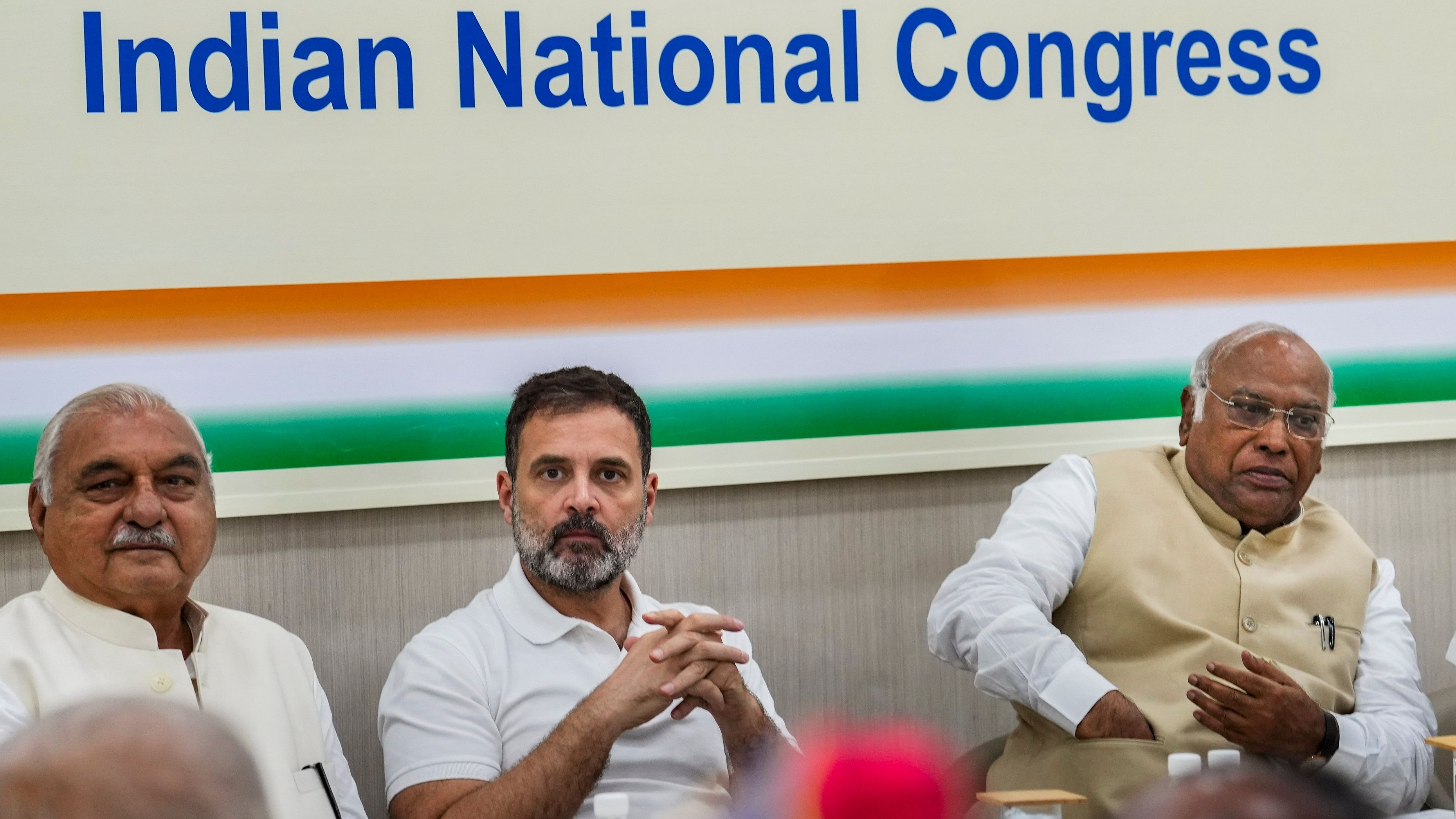 <div class="paragraphs"><p>File Photo: Congress President Mallikarjun Kharge with party MP Rahul Gandhi and former Haryana CM Bhupinder Singh Hooda during a party meeting, at AICC headquarters in New Delhi.</p></div>