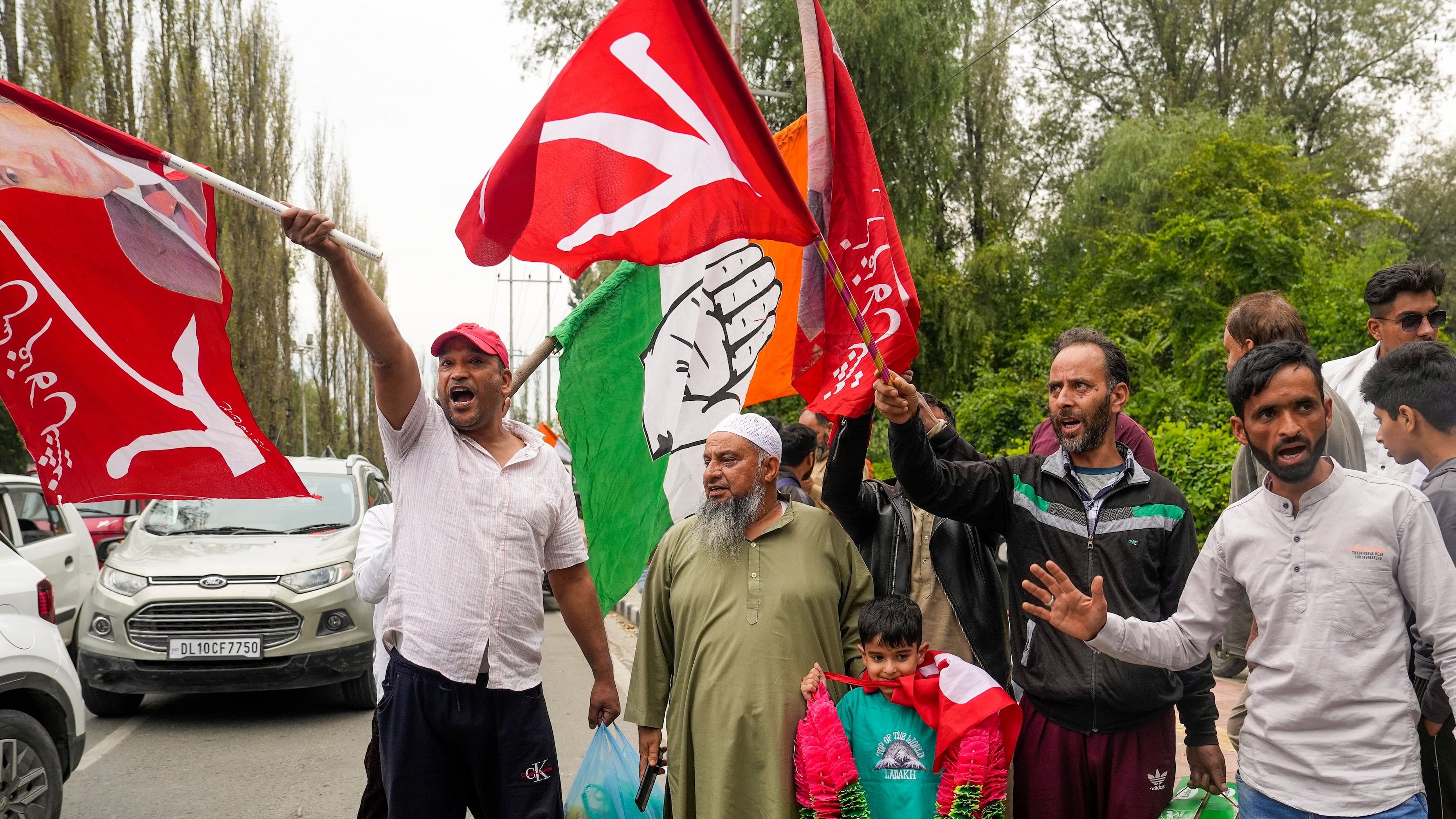 <div class="paragraphs"><p>Congress party and National Conference supporters celebrate J&amp;K Assembly poll results, in Srinagar, Tuesday, October 8, 2024. </p></div>