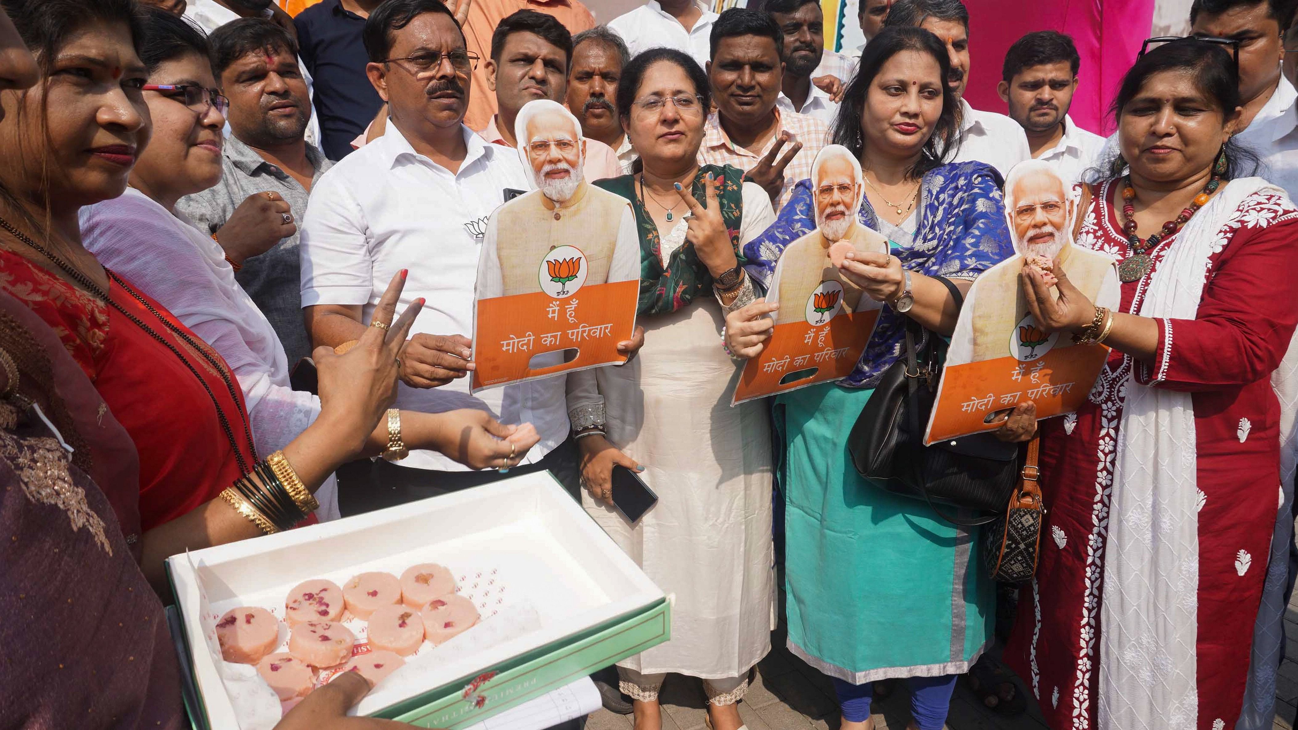 <div class="paragraphs"><p>BJP workers celebrate the party's lead during the counting of votes of Haryana Assembly elections</p></div>