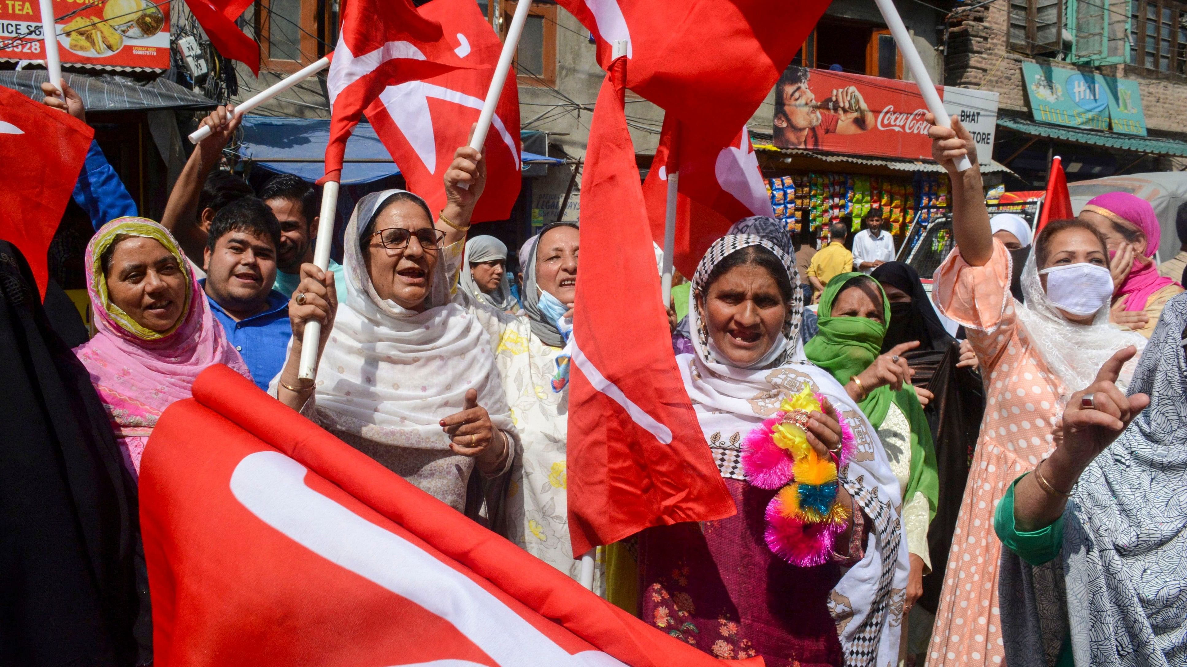 <div class="paragraphs"><p>Jammu and Kashmir National Conference (JKNC) supporters celebrating in Srinagar.</p></div>