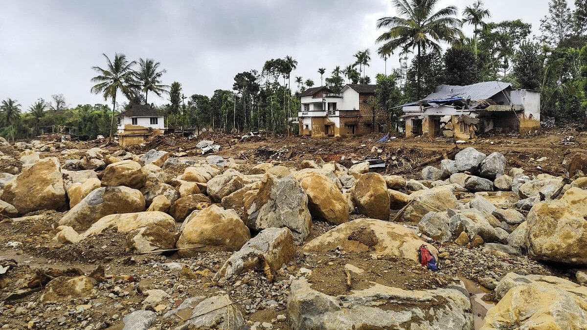 <div class="paragraphs"><p>Damaged houses and the terrain in the Chooralmala village after the Wayanad landslides.</p></div>