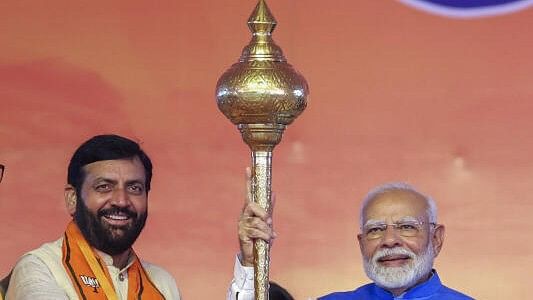 <div class="paragraphs"><p>Haryana CM&nbsp;Nayab Singh Saini (left) with PM Narendra Modi</p></div>