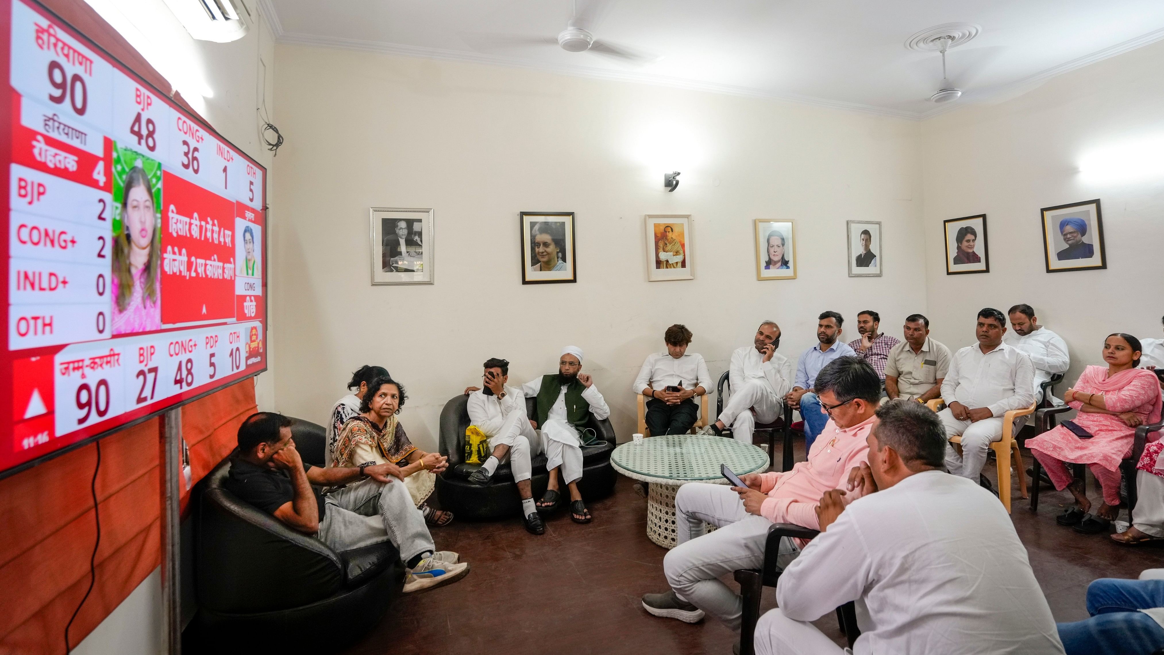 <div class="paragraphs"><p>Congress supporters watch TV at the residence of party leader Kumari Selja for Haryana Assembly polls results as counting of votes is underway, in New Delhi on Tuesday, October 8, 2024. </p></div>