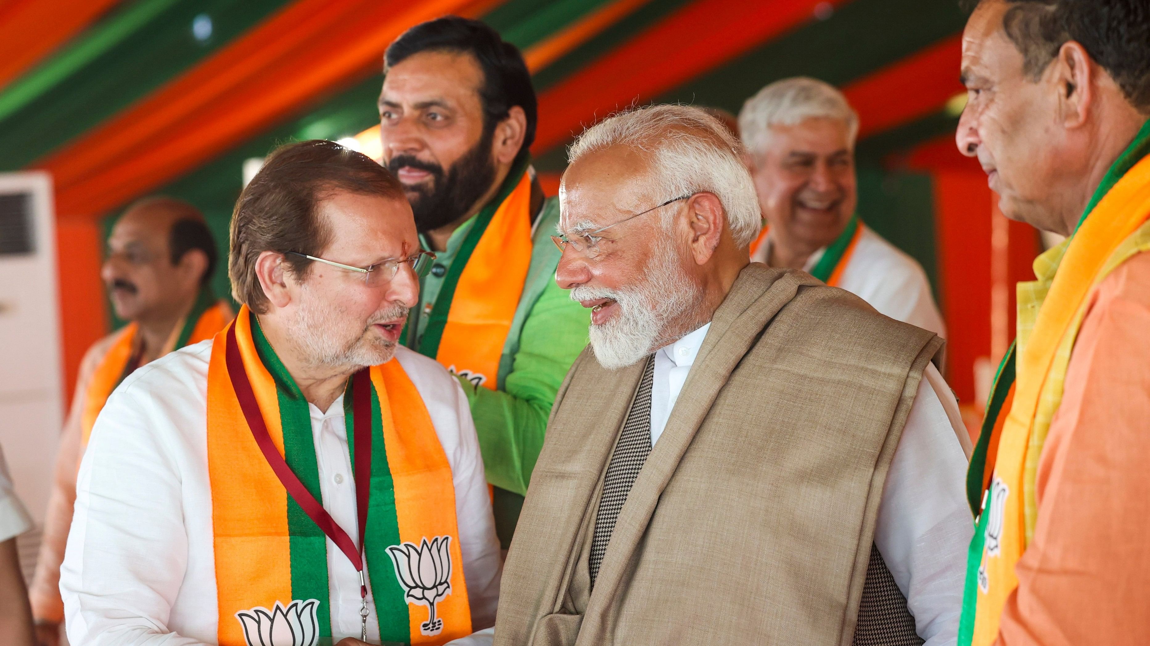 <div class="paragraphs"><p> Prime Minister Narendra Modi with Haryana Chief Minister Nayab Saini, Mohan Lal Badoli and party candidate from Rohtak constituency Arvind Sharma during a public meeting for the Lok Sabha elections, in Sonipat district, Saturday, May 18, 2024. </p></div>