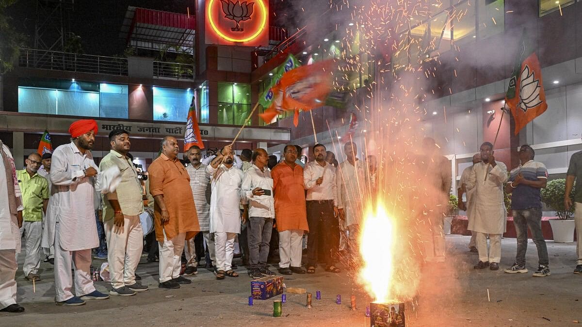 <div class="paragraphs"><p>BJP workers burst firecrackers during celebration after the party's victory in the Haryana Assembly elections.</p></div>